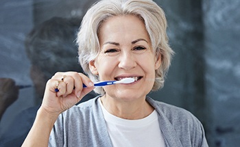 Dental implants save you money on care and replacement costs over time