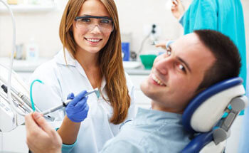 Smiling man in dental chair