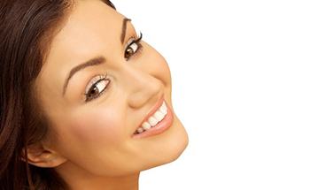 Close up of smiling woman with veneers