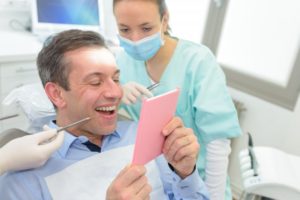 man smiling in mirror