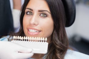 woman receiving porcelain veneers