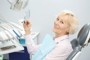 Woman excited to replace her dentures