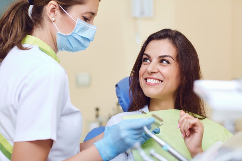 Woman smiling after her dental checkup